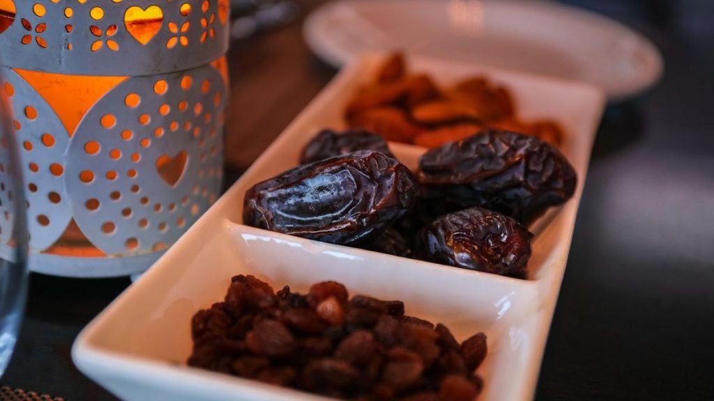 Moroccan dates and a lantern set out for iftar