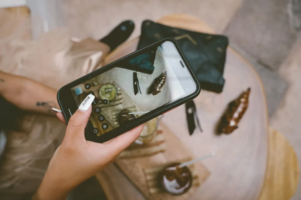 Hands holding a smartphone and setting it up