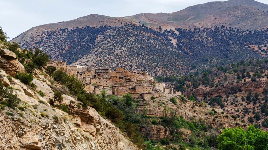 Picturesque view of a historic village nestled in the Moroccan Atlas Mountains.