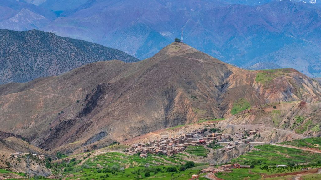 Breathtaking view of the Atlas Mountains and a traditional village in Morocco.